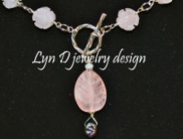 Rose quartz leaf and flowers, with pearl accents